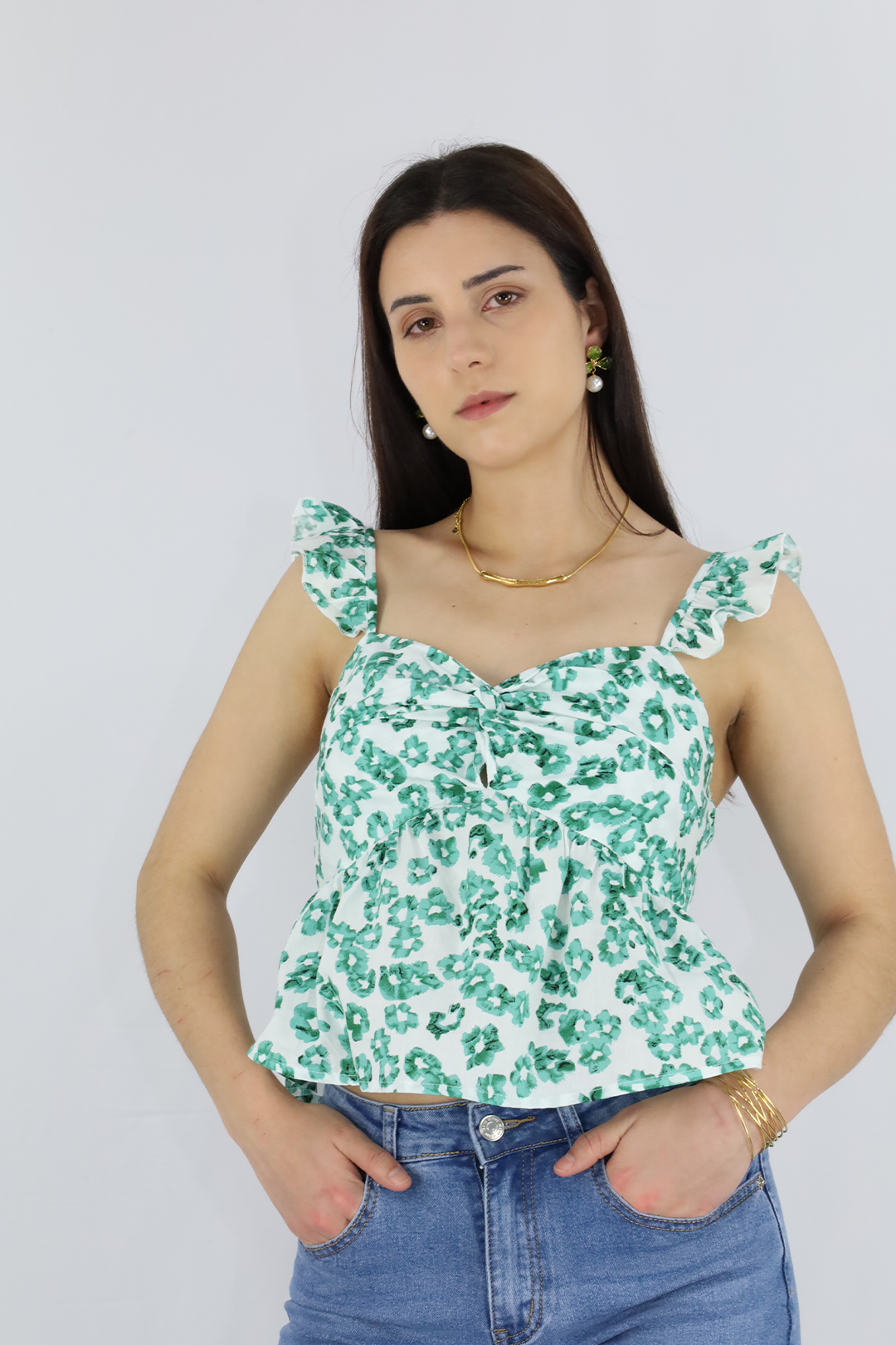 Top con volante floral verde