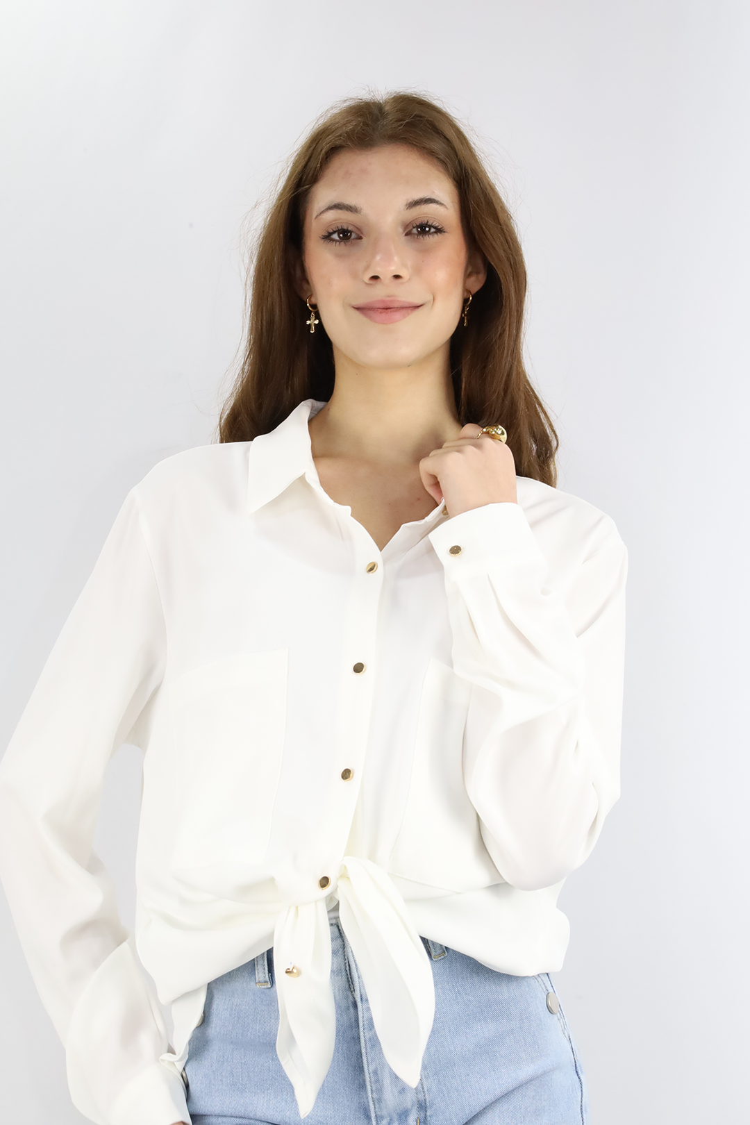 Blusa cuello camisa con bolsillos